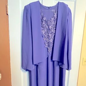 Worn once for a wedding.Periwinkle in color. Zipper in back mid calf length.